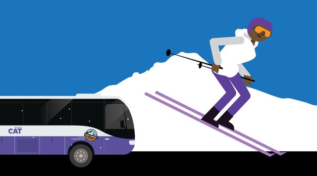 bus with skier in front of mountain